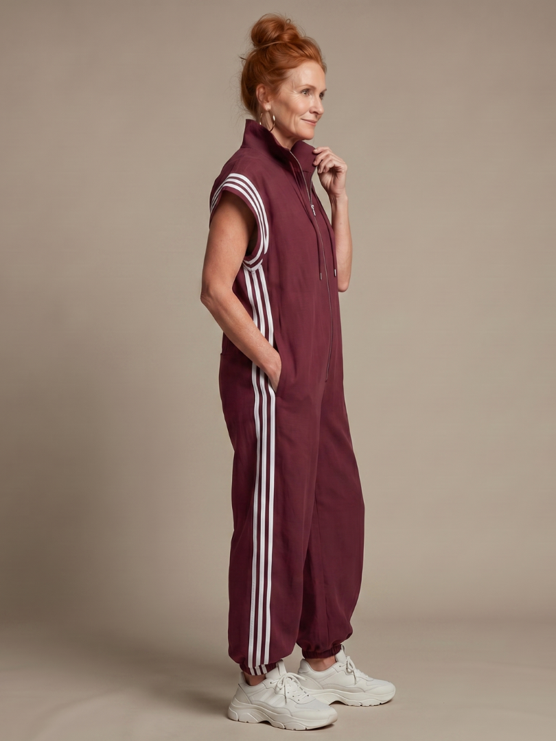 Lark | Jumpsuit s krátkými rukávy, zipem a bočními pruhovanými panely